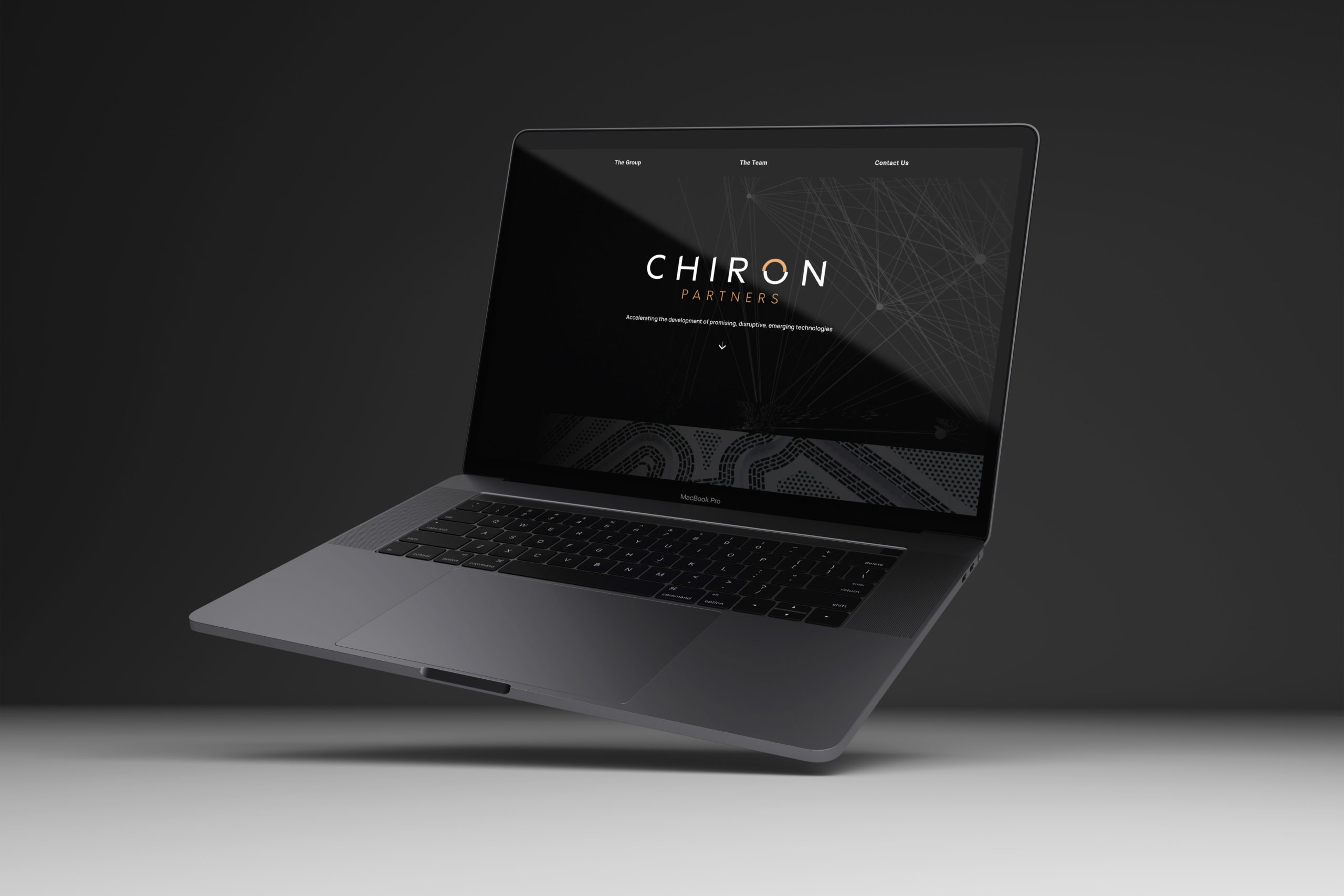 Chiron Partners website shown on laptop with a dark background