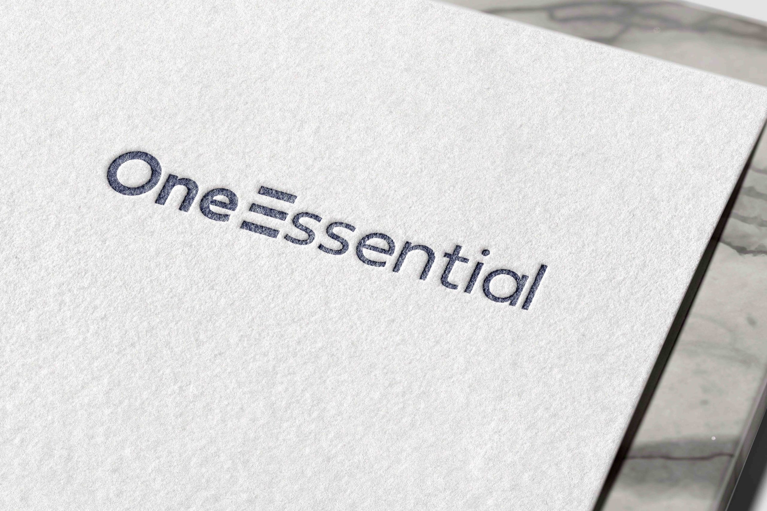 OneEssential Branding Logo Embossed On Paper